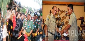 BUKA SOSIALISASI, Bupati Sintang, Milton Crosby tiba di kecamtan Ambalau  Disambut dengan ritual adat dayak saat membuka sosialisasi Hukum adat Dayak dan melayu